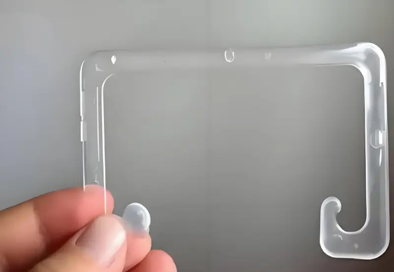Hand holding a transparent bubble plastic product