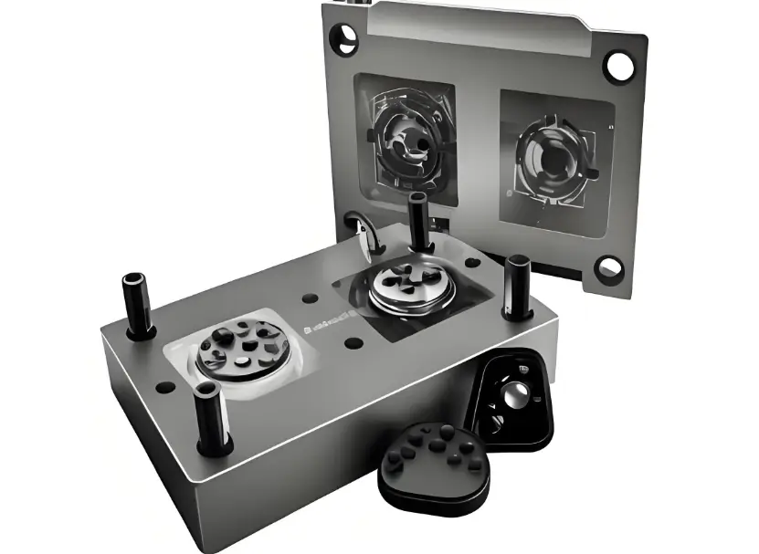Open metal injection mold with components visible