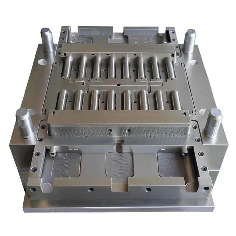 Silver metal mold with intricate design and multiple components.