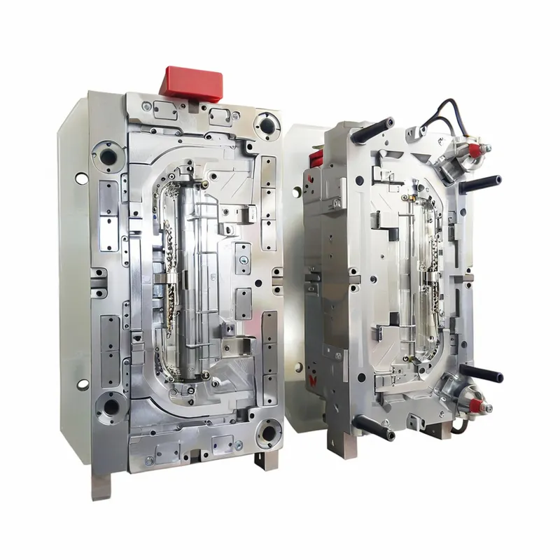 Two parts of an industrial injection mold used for manufacturing.