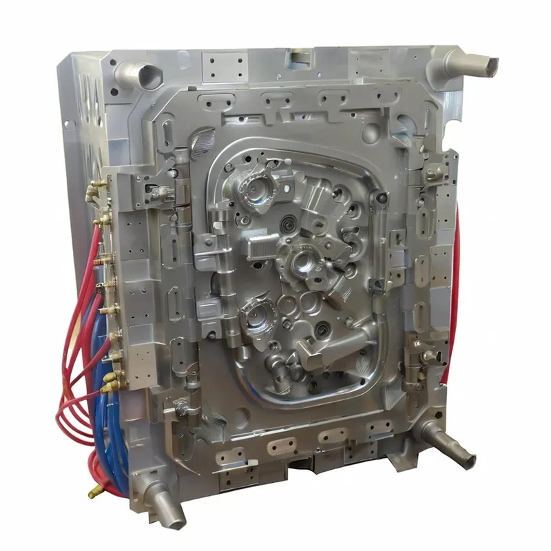 Complex metal mold with intricate patterns and attached cables for injection molding.