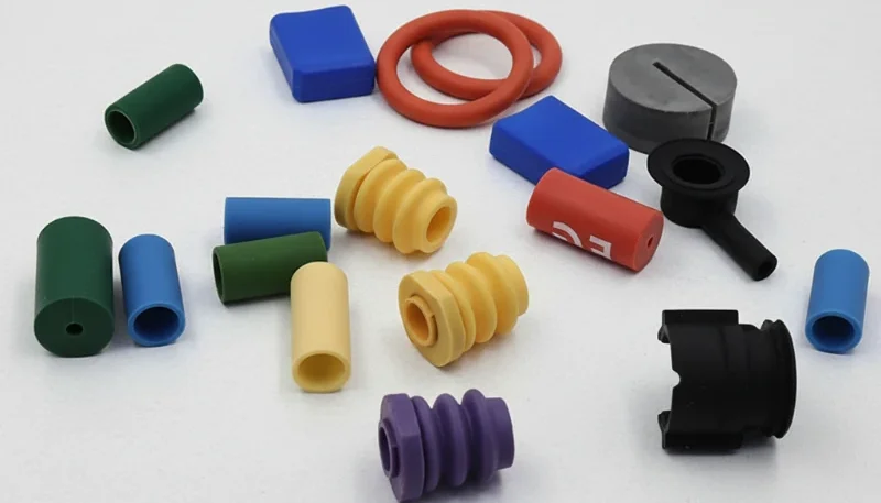 Colorful injection molded plastic parts demonstrating diverse manufacturing capabilities