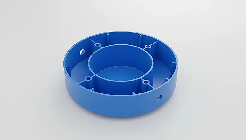 Pièce circulaire bleue moulée par injection plastique