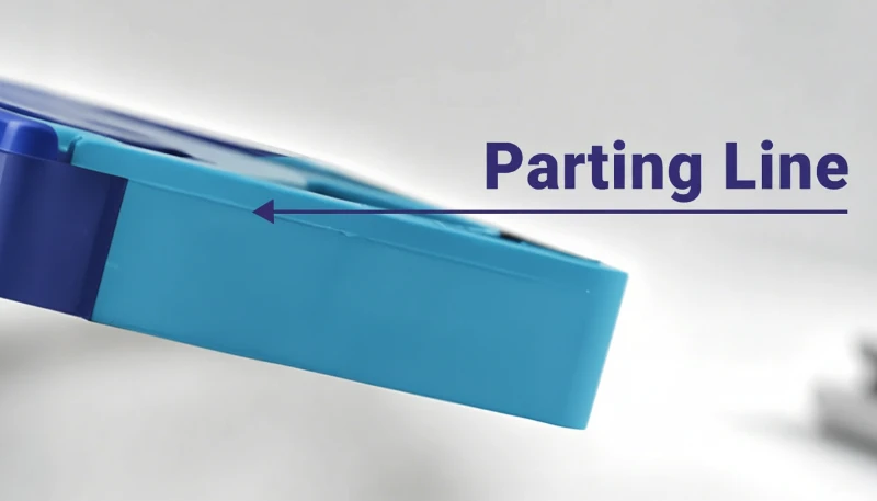 Close-up of plastic part highlighting parting line